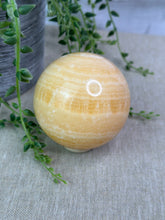 Load image into Gallery viewer, Orange Calcite Sphere
