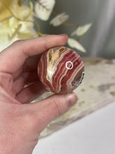 Load image into Gallery viewer, Rhodochrosite Sphere #299

